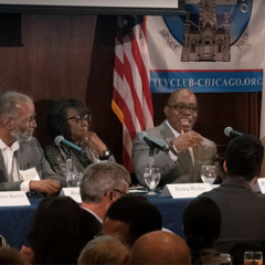 GCI presenting with city stakeholders, demonstrating its mission to link academic expertise with partners to address urban issues.