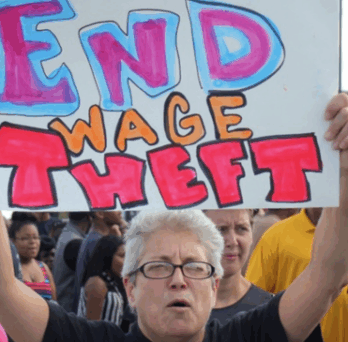 The Cook County Board President said the law “will make Cook County a national leader in targeting wage theft.” (Wisconsin Jobs Now / Flickr) 