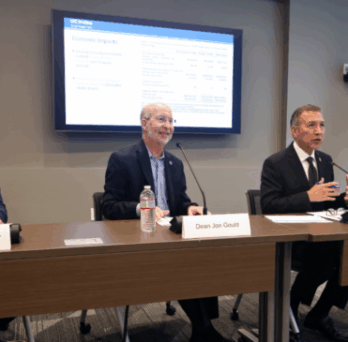 A room full of business leaders listened to, pictured above from left, T. William Lester, Dean Jon Gould, Orange County Supervisor Vicente Sarmiento and Raiven Greenberg present the findings from a survey on the impacts of immigration and tariff policies. Photos by Karen Tapia 
