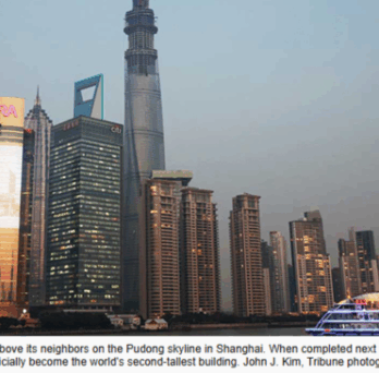 The Shanghai Tower soars above its neighbors on the Pudong skyline in Shanghai. When completed next year, the 2,073-foot-tall tower will officially become the world’s second-tallest building. John J. Kim, Tribune photographer 
