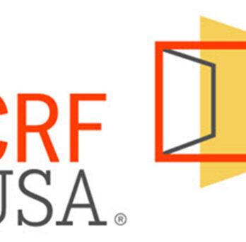 CRF USA logo with red and gray text beside a yellow and orange open-door graphic. 