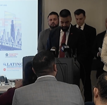 Photo from the “Latino Chicago and the Future of the City” event, showing speakers gathered at a podium during a presentation at the Great Cities Institute.